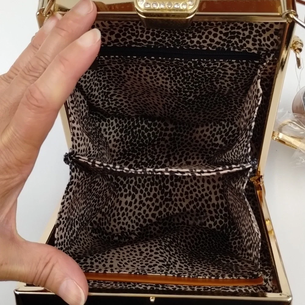 Sophisticated Brown Baby Bag with Gold Accents